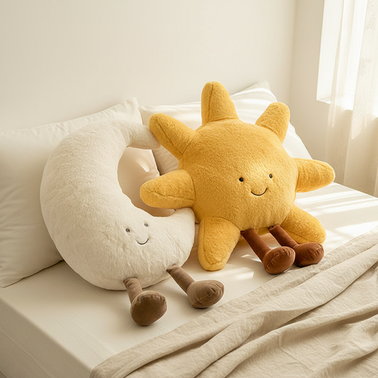 Sun and moon pillows on white bed